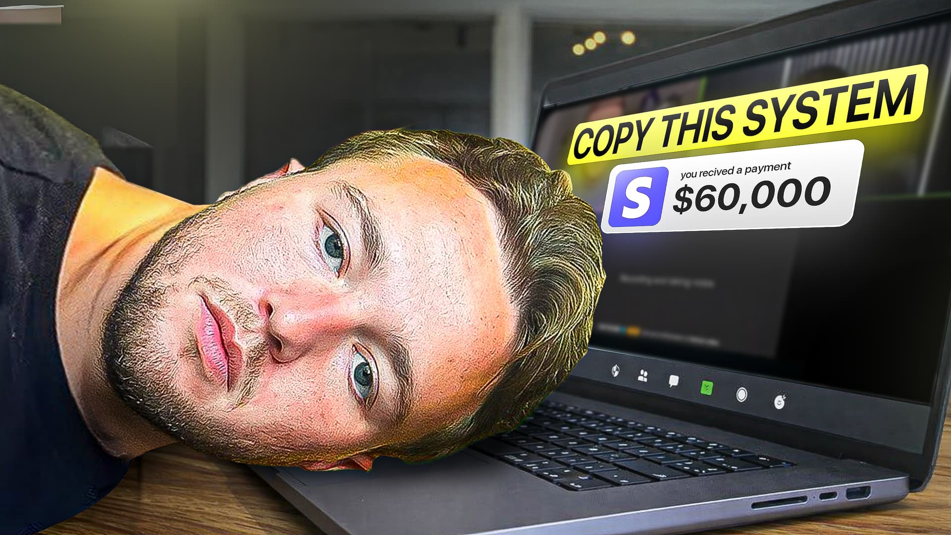 Homme posant sa tête sur un clavier d'ordinateur affichant un virement de 60 000 dollars.